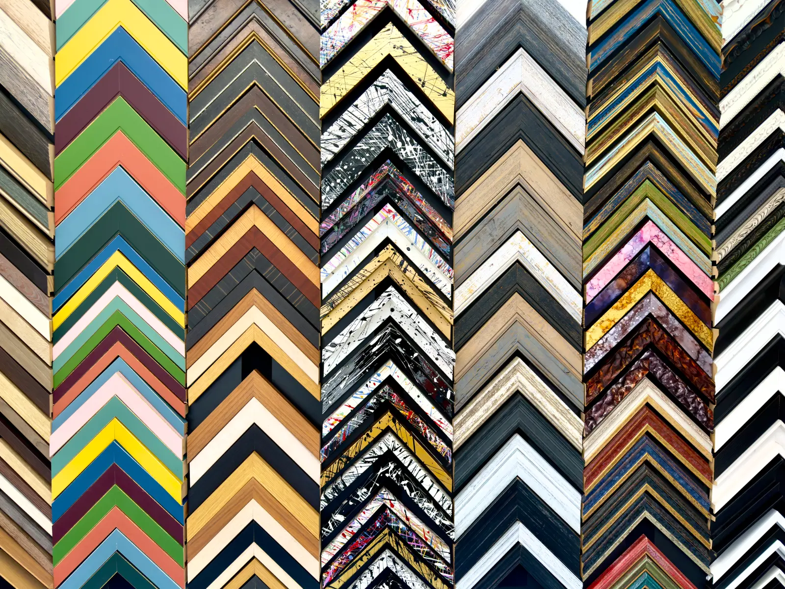 A wall of moulding samples in the Vantage Point Creative shop
