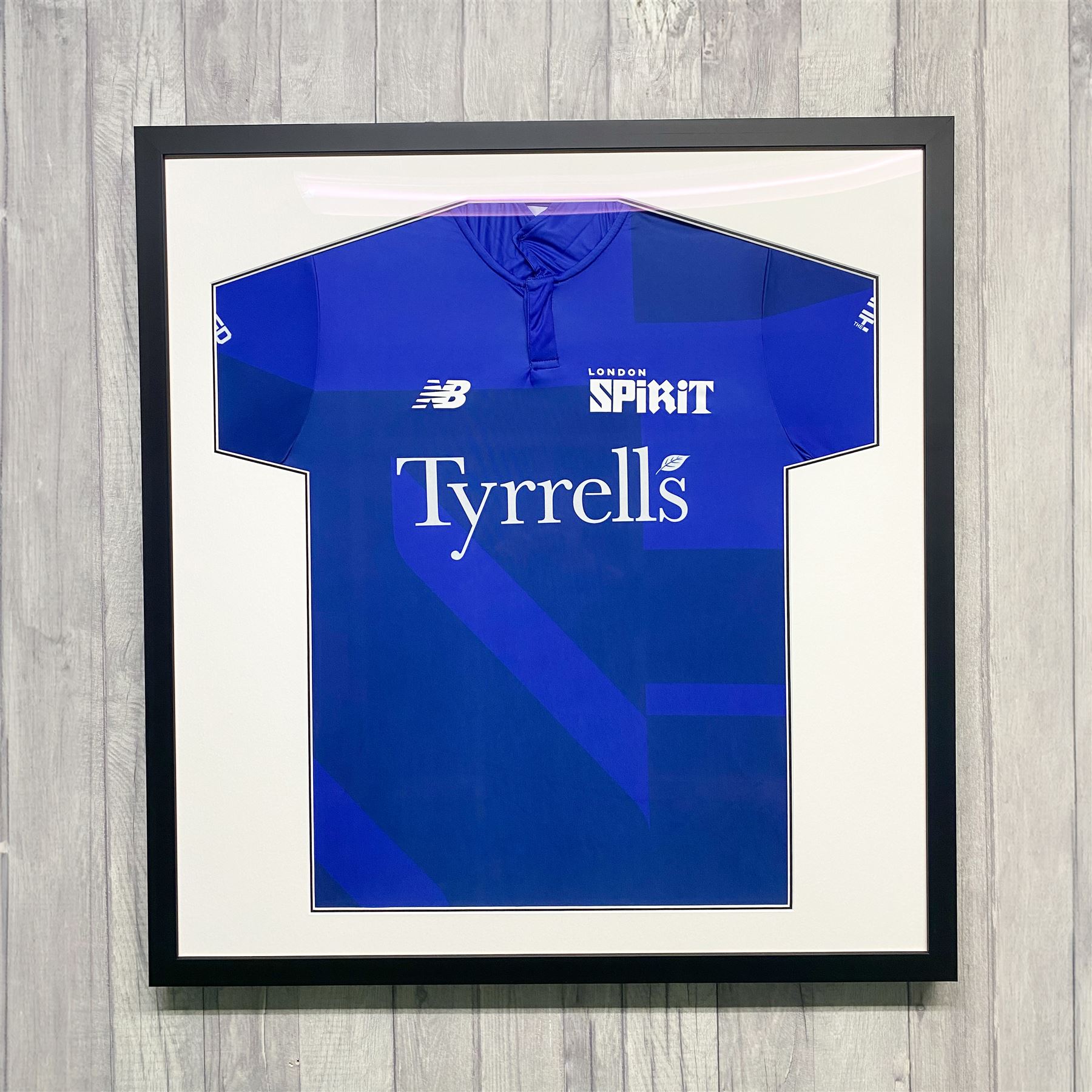 Box-framed London Spirit cricket shirt
