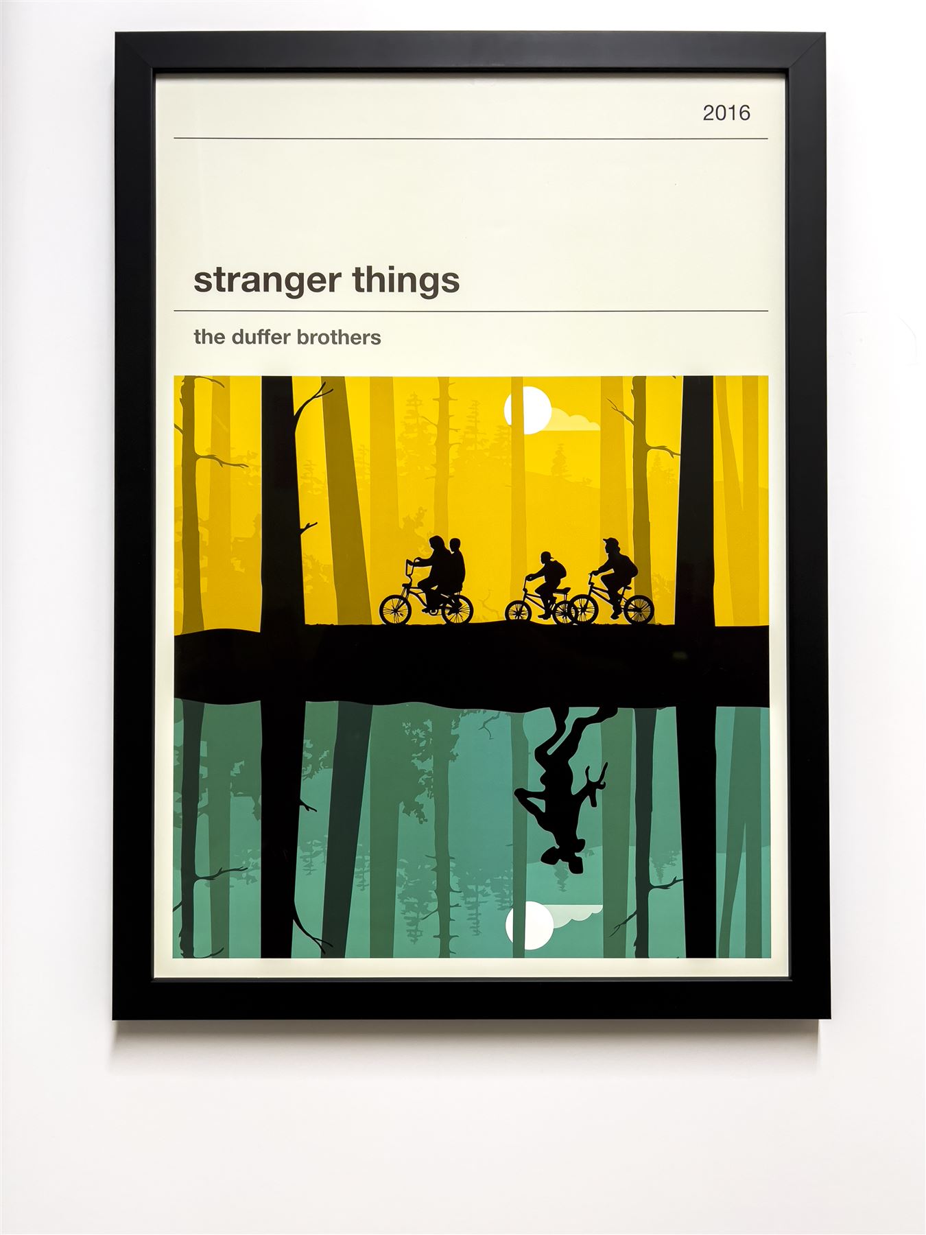 Stranger Things film poster in a black frame